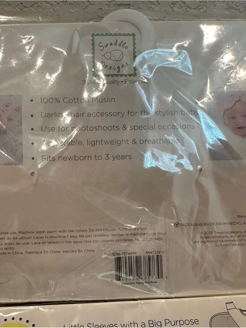 Swaddle designs sleep sack and matching muslin headband! NEW in package!